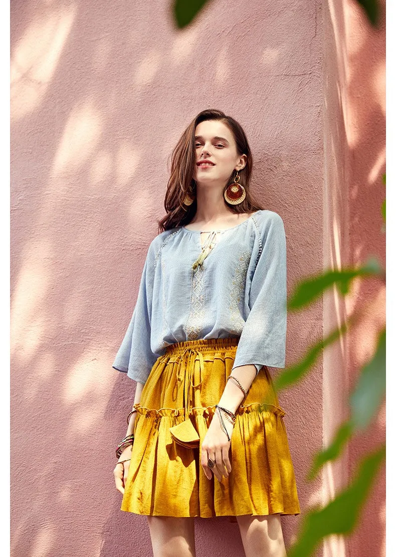 ARTKA EMBROIDERED TASSEL TIE BLOUSE IN BLUE