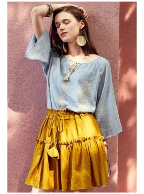 ARTKA EMBROIDERED TASSEL TIE BLOUSE IN BLUE