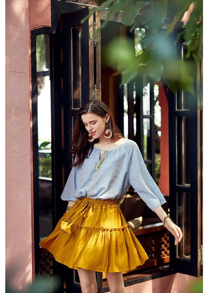 ARTKA EMBROIDERED TASSEL TIE BLOUSE IN BLUE