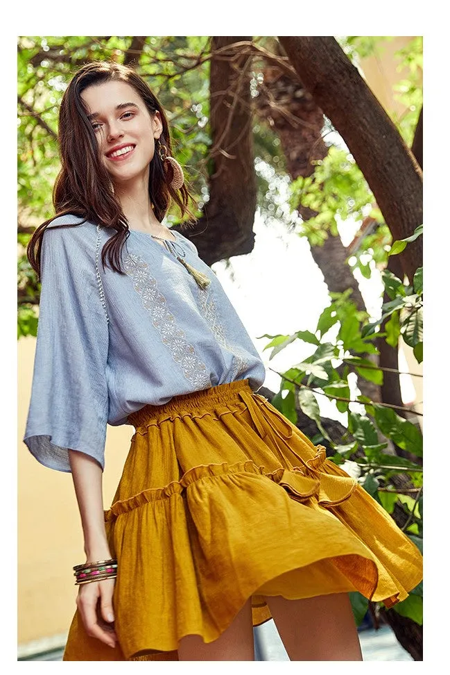 ARTKA EMBROIDERED TASSEL TIE BLOUSE IN BLUE
